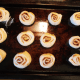 Cut into 12 pieces. Place rolls onto a greased baking sheet. Cover with a cloth and allow the rolls to rise in. a warm place so that they double in size.