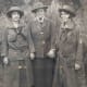 Girl Scout Robertine "Robbie" McClendon, (left) of Thomasville, Ga., Juliette Gordon Low (center) holding hands with Girl Scout Helen Ross (right), of Macon, Ga., after Low presented them with the Golden Eaglet, May 1925, in Macon, Ga.