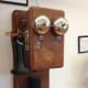 Although wall phones were made with the same materials, wood and metal, they could have slightly different looks.