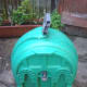 The back of the Hozelock hose reel, showing the slots which slide onto the wall mountings (not shown)