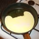 Cream is combined with chicken broth