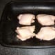 Chicken thighs ready for roasting