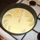Potatoes are added to cream and chicken broth