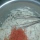 Add grated carrot to batter.