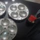 Grease the idli molds.
