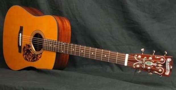 cheapest solid wood taylor guitar