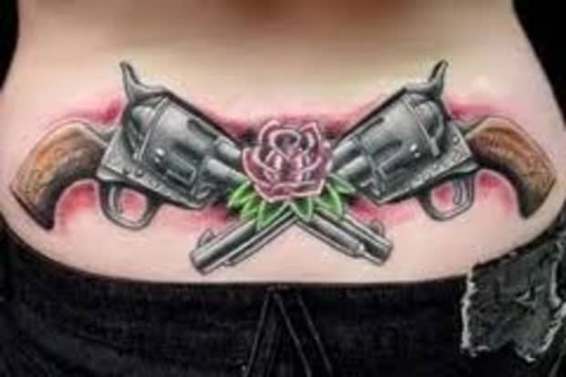 Gun Tattoos Meanings Designs And Ideas Tatring