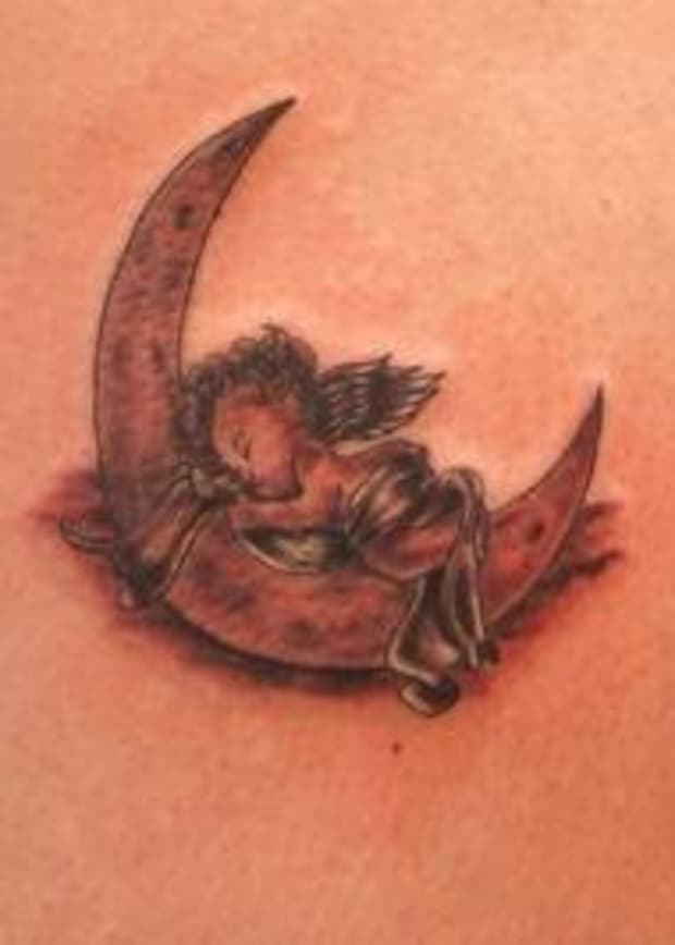 Cherub And Baby Angel Tattoo Designs And Meanings Tatring