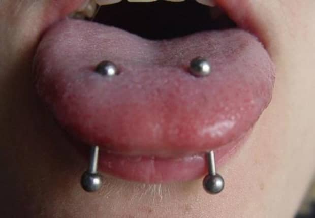 Venom clearance tongue piercing