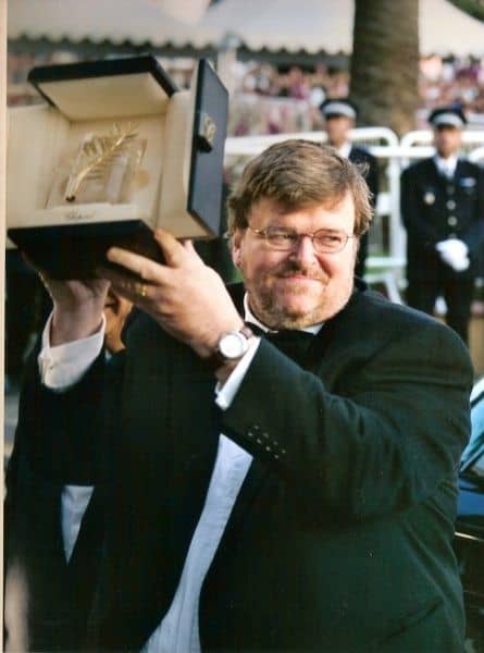 Michael Moore receiving the Palme d'or at the Cannes film festival, for "Fahrenheit 9/11"