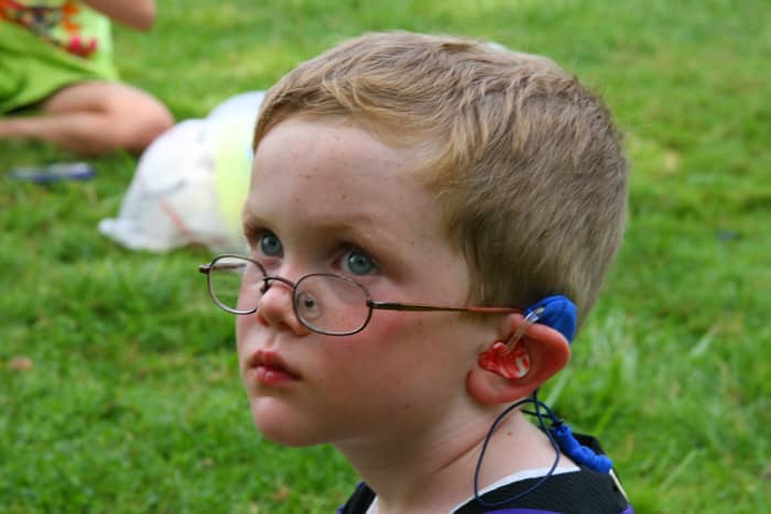 Ear Gear are neoprene sheaths that protect hearing aids from sweat, dust, and water.