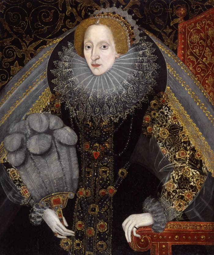 Queen Elizabeth I wore heavy garments out of necessity due to the cold climate.