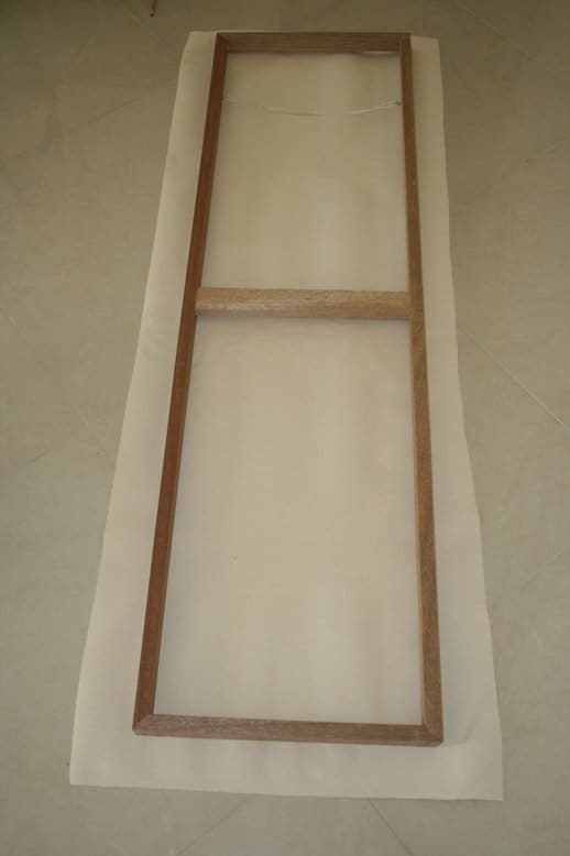 Make sure the canvas is big enough to fit all they way round the sides and onto the back of the frame.