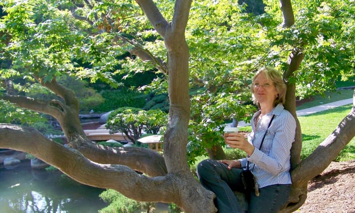 I used to like to hide in trees and read—the higher the climb, the better. Now it's enough to sit and enjoy a cup of coffee under the shady canopy.
