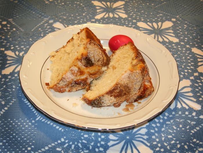 Although this is Bulgarian Easter Bread, it is quite similar to how the Croatian bread looks when it's cut into wedges and arranged on a plate. A hard-boiled Easter egg is added on the side as a garnish.
