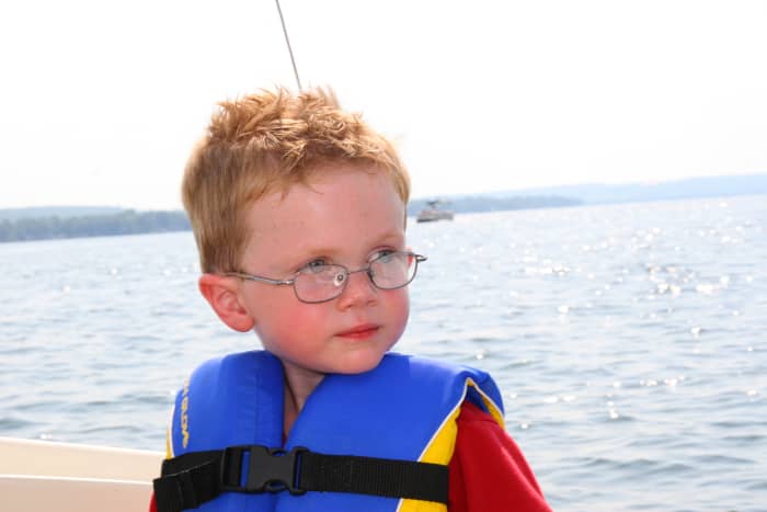Life jackets are a must when sailing with children: be sure the jackets fit well by testing in a pool prior to embarking on a sailing adventure.