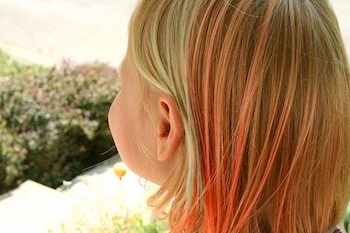 Dyeing your hair with Kool-Aid provides temporary colour.