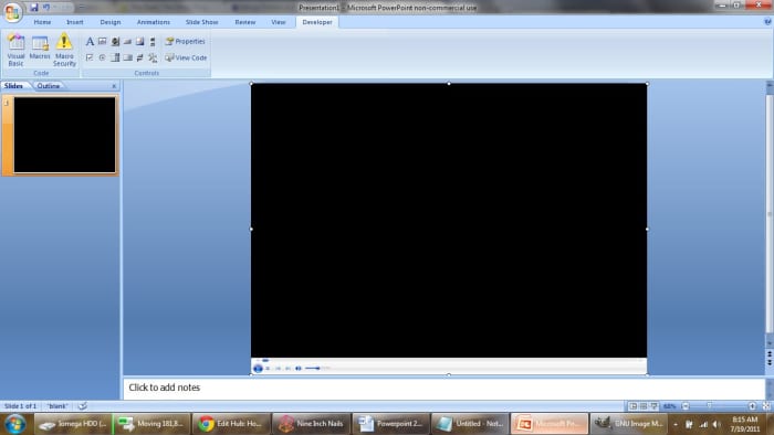 This is a picture of the embedded Windows Media Player in PowerPoint. Notice how the media player is stretched so its controls will not appear on the presentation.