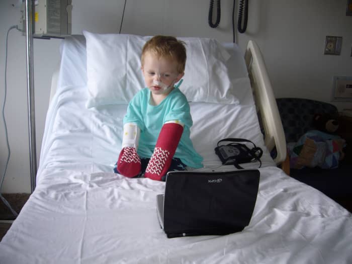 Arm bands called "no-no's" and socks were used to prevent our son from pulling out the probe. A portable DVD player kept him entertained during the hospital stay.