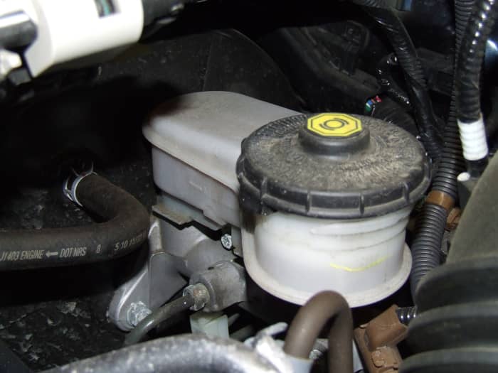 Brake fluid reservoir. if your brake pedal is soft; first check the fluid level to determine if you have a leak in the braking system.
