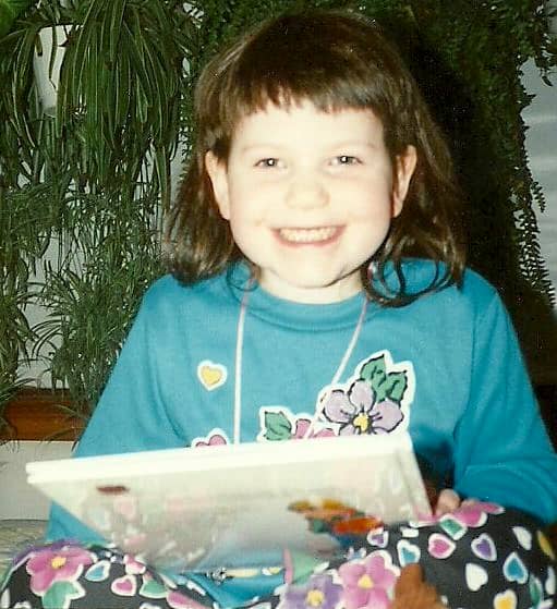 Here is my daughter at four years of age enjoying some reading—and yes, she really was reading, not just pretending or looking at the pictures.