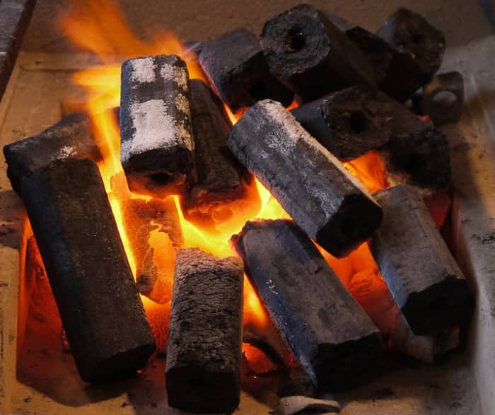 Charcoal briquettes are blocks of compressed coal dust, charcoal dust, sawdust, and wood chips or biomass and are used as fuel in stoves and boilers.