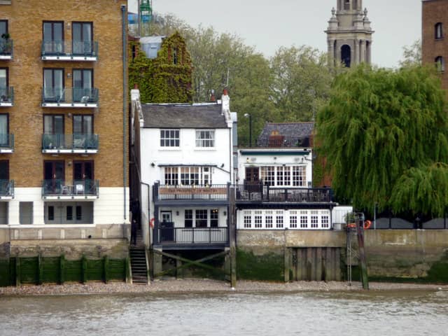 The Prospect of Whitby viewed from the River side. The tower of St Paul's Church can be seen behind.