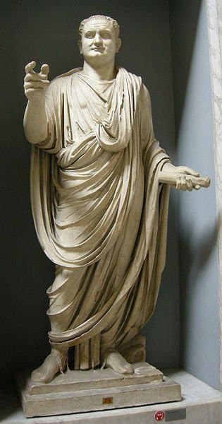 A Roman aristocrat. (Actually, it's Titus, emperor and son of the wonderfully down-to-earth emperor Vespasian, but he's dressed as a typical Roman noble in a senatorial toga.)