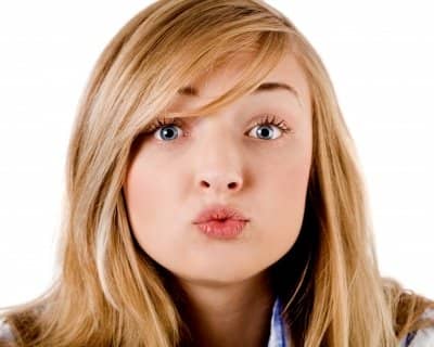Seal it with a kiss! There are plenty of idioms or idiomatic expressions about kiss that English as a Second Language students ought to learn.