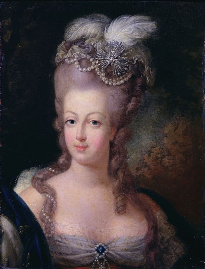 Marie Antoinette sporting the pouf hairstyle in 1775—an elaborate construction first developed by Léonard Autie.