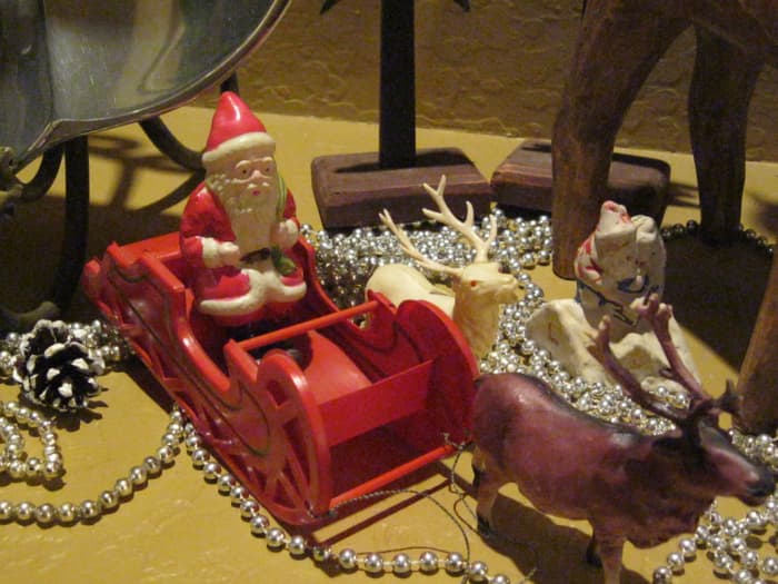 These vintage celluloid Santa, sleigh and reindeer are from the 1930s. It is rare to find a matched set this old.