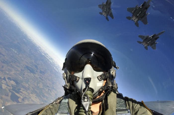 Inside cockpit of USAF F-15E Strike Eagle flying in formation with other F-15E fighters (photo courtesy of USAF)