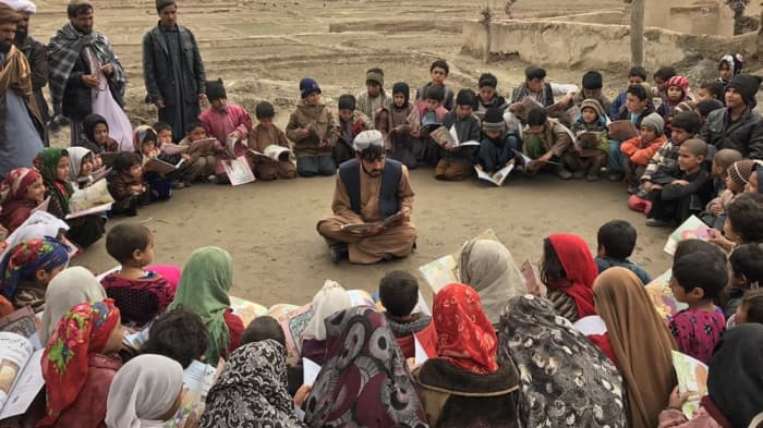 Matiullah Wesa, man on a campaign to reopen schools across Afghanistan, gives free open-air classes.