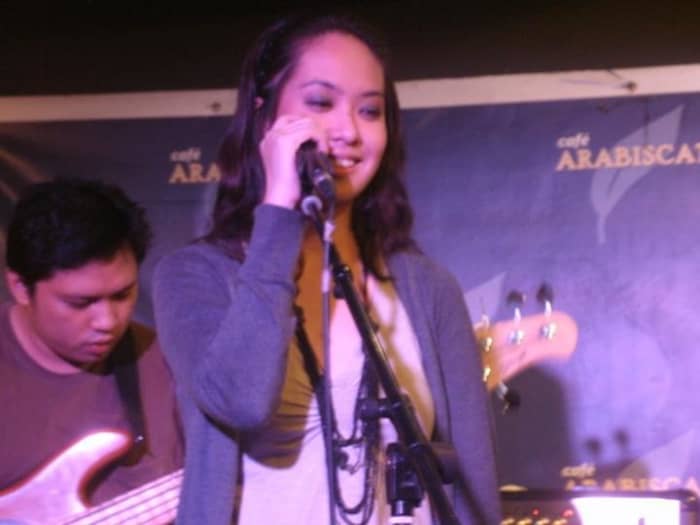 Singing in one of my band's (AMIHAN) rock gigs. Photo taken at Cafe Arabiscato, SSS Village, Marikina City