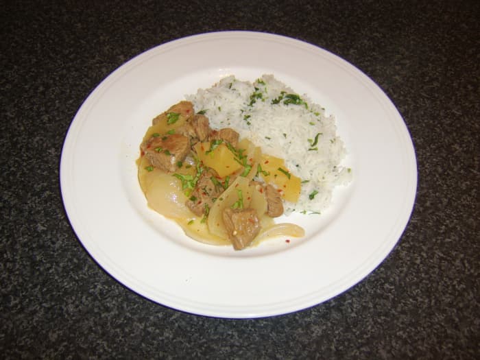 Spicy pork, pineapple and apple cider casserole, served with herb and garlic rice, is just one of the casserole recipes featured on this page