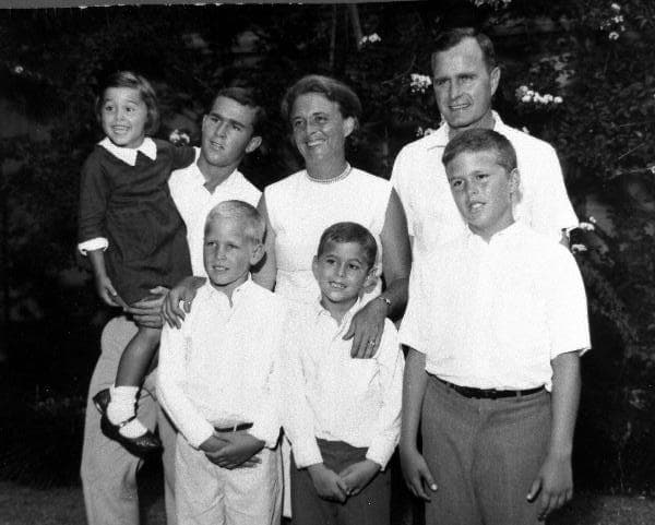 Early 1960s photo of the George and Barbara Bush family. Front: Neil, Marvin, and Jeb. Back: Dorothy, George W., Barbara, George H.W.