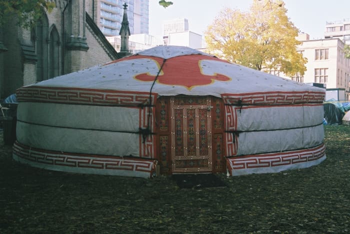 This is a Mongolian Yurt placed downtown Toronto, at St. James Park, next to the St James Cathedral.