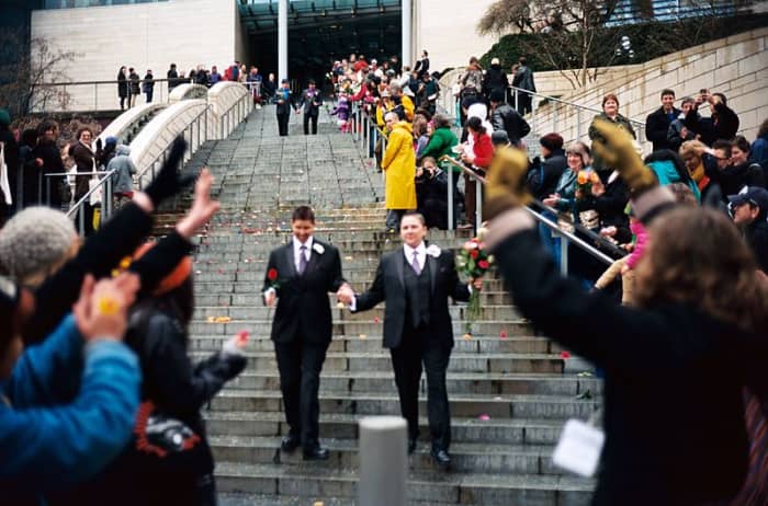 Recently married couples leaving the City Hall in Seattle on the first day of same-sex marriage in Washington state after enactment of Washington Referendum 74.
