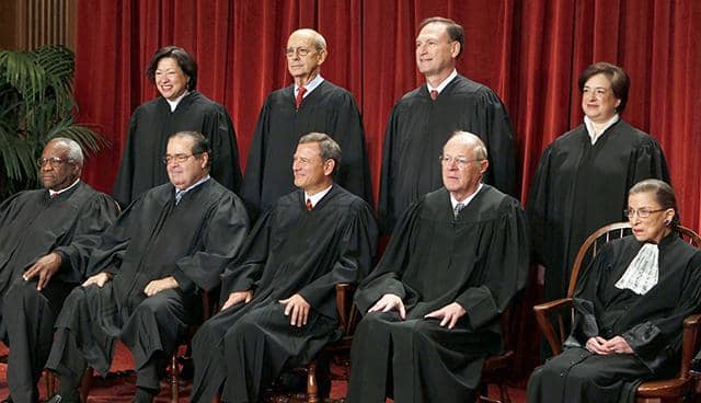 The 2013–14 Supreme Court. Back row L-R: Sotomayor, Breyer, Alito, Kagan. Front L-R: Thomas, Scalia, Roberts, Kennedy, Ginsburg.
