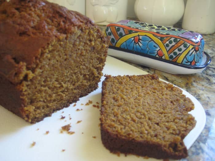 Moist, tender and delicious pumpkin bread with a bit of a healthy twist. I've set the butter dish out, but this moist bread doesn't need it!