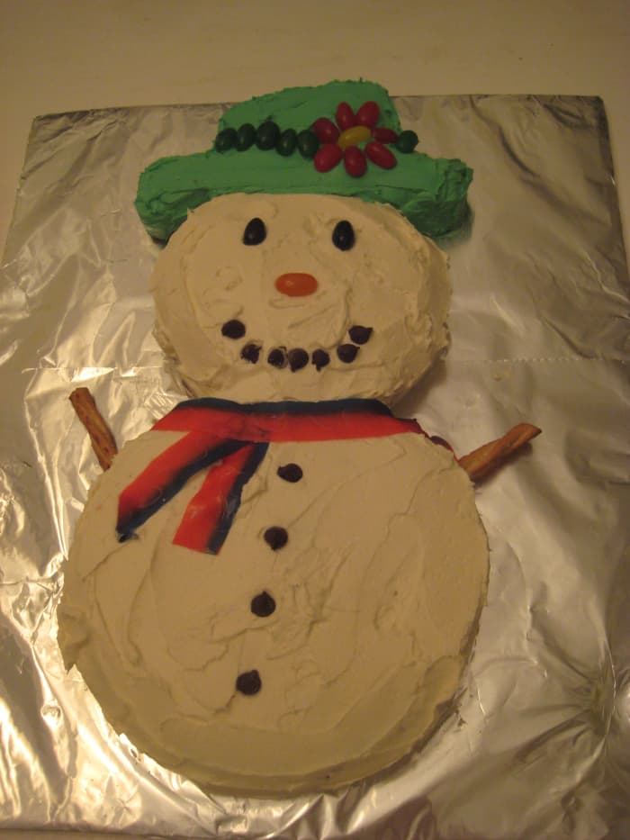 How to Make a Fun and Easy Snowman Cake - Delishably