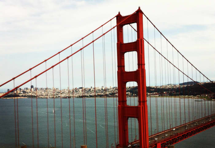 The view of the Golden Gate Bridge and San Francisco from the Marin Headlands. Stop here to see this view on your way north from San Francisco to Sausalito and Muir Woods.