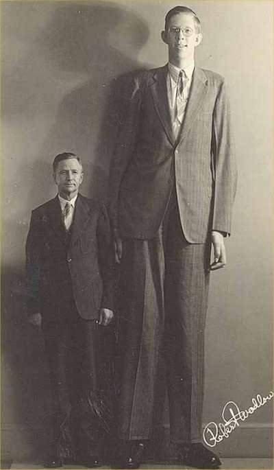 Robert Wadlow, who, at 8' 11", is the tallest person in recorded history. His height was due to a pituitary gland disorder which produced abnormal levels of human growth hormone (HGH).