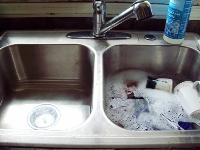 One side of my sink has the dishes all soaped up. The other side has some hot water in it for rinsing. Incredibly, doing dishes this way saves water, energy, and time!