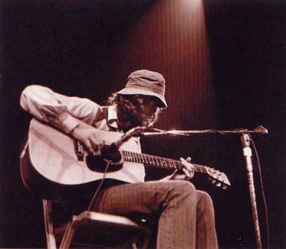 Jimmy Page with Led Zeppelin playing his Martin D-28.
