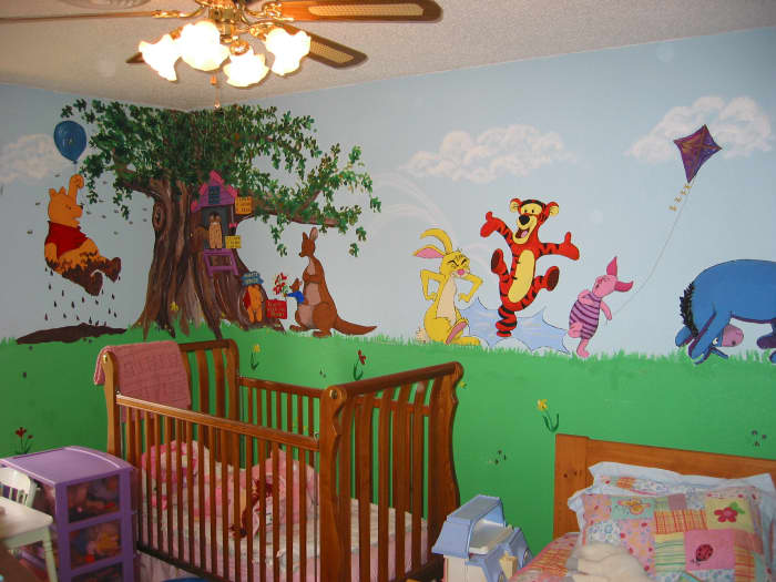 A tree wall mural is great all on its own. It looks terrific in a corner. I used sponges shaped like leaves and dipped them into two colors of green paint.
