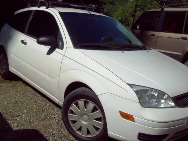 My beloved car. I carry only liability insurance on it, but I have taken measures to ensure I can fix it if need be.