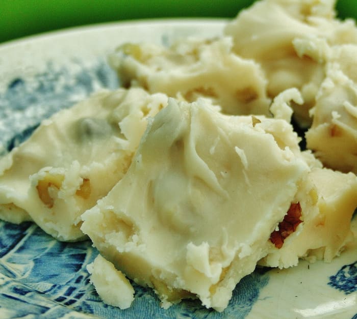 This sour cream fudge is made from milk, butter, sugar, sour cream, vanilla & walnuts.