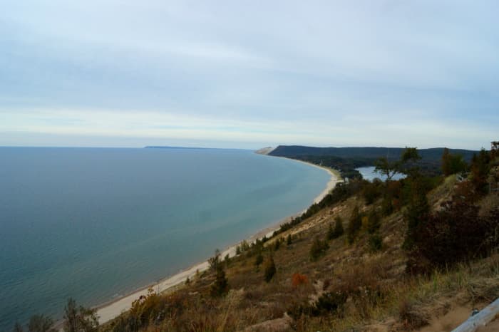 View of Lake Michigan, South Manitou Island and Sleeping Bear Dunes shoreline from the Empire Bluff Trail Overlook.