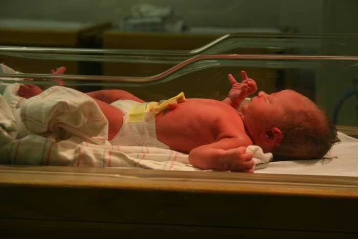 What does a newborn baby need? Diapers, clothes, and a lot of love.